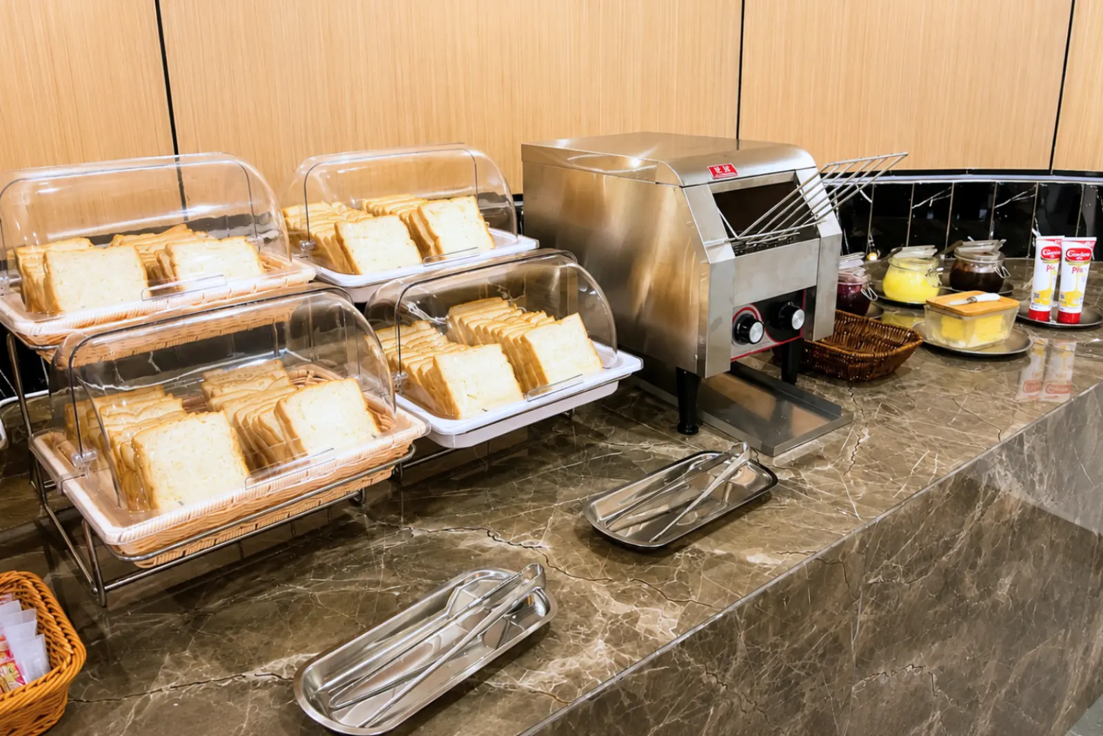 Toast and bread station with the toaster, jams and spreads
