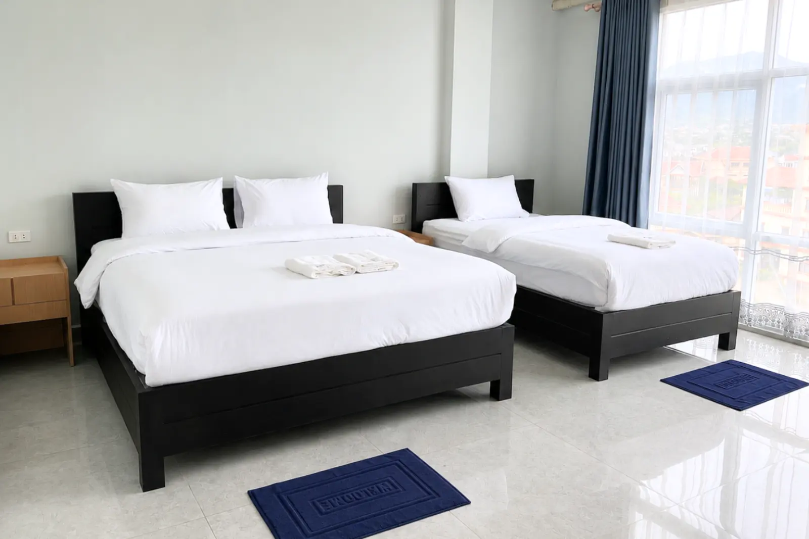Family room with a wide window over the valley
