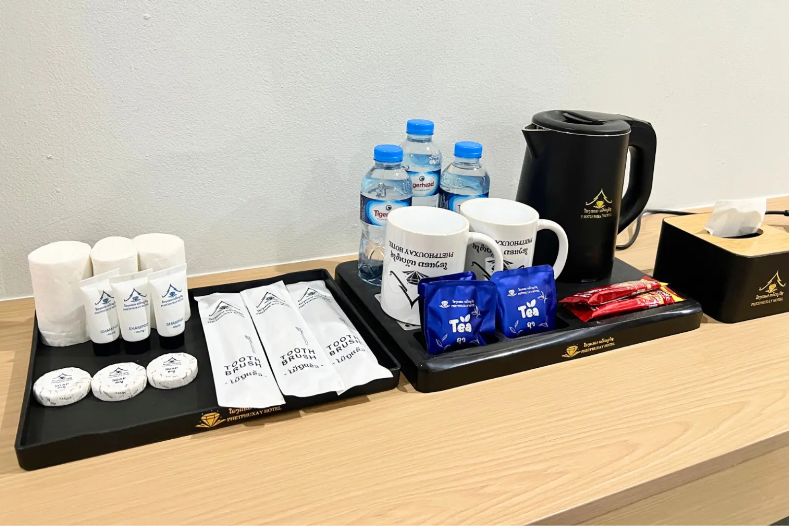 Phetphouxay Hotel toiletries, kettle, tea and coffee set out in the room