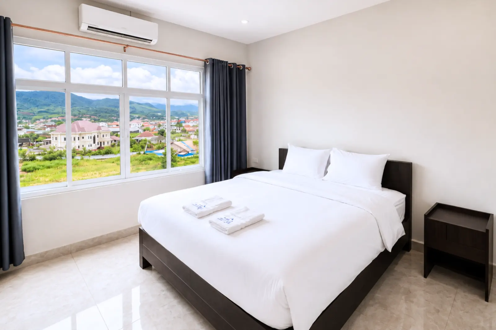 Single room with double bed and town view
