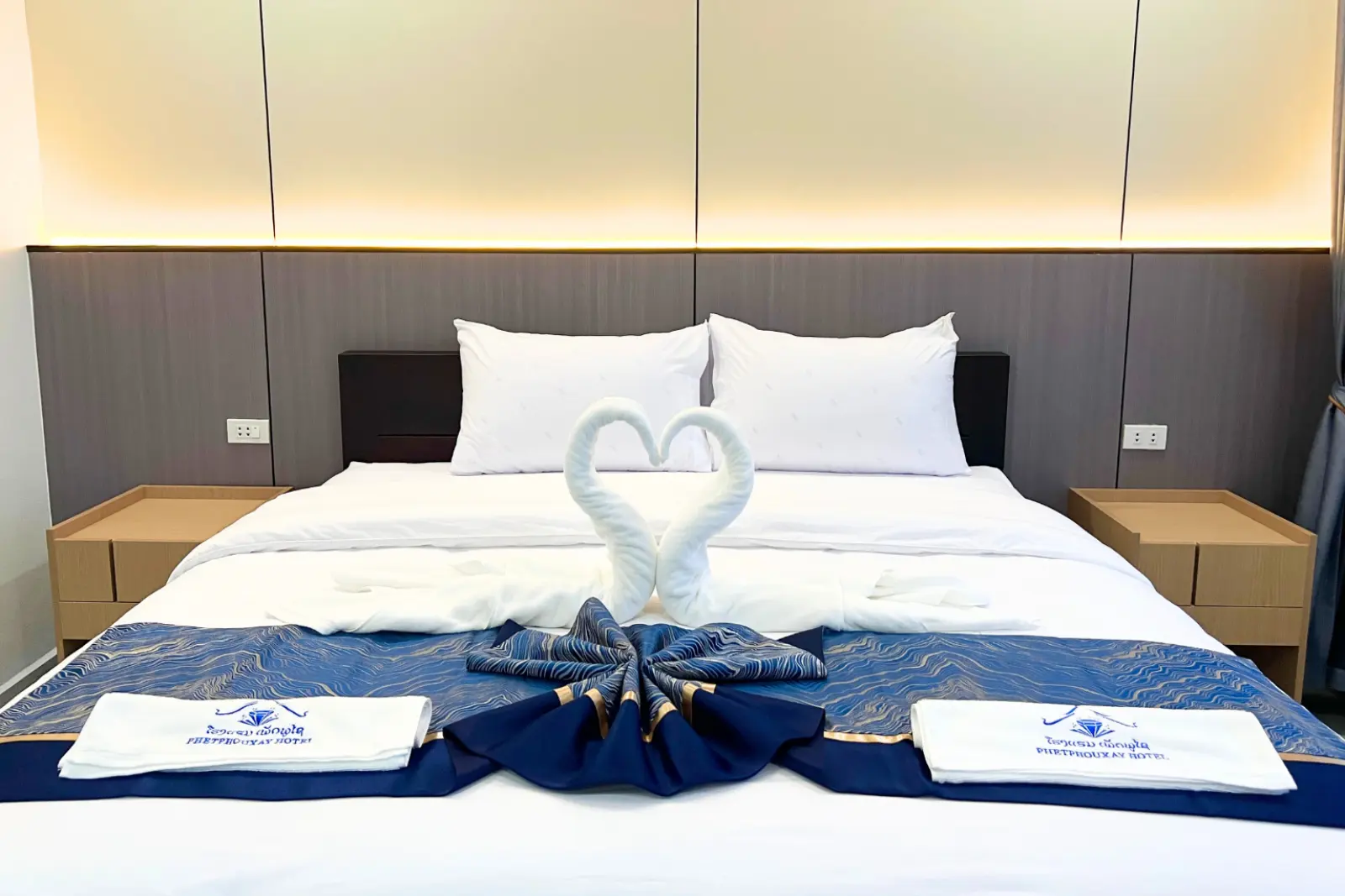 VVIP suite king bed with turndown detail