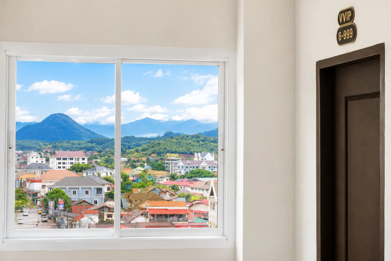 Window at the end of the guest-room corridor, beside a VVIP suite door